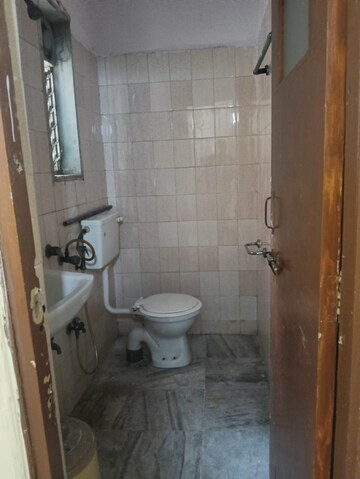 Bathroom in 3 BHK Apartment at Kopar Khairane – for Rent