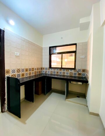 Kitchen in 1 BHK Apartment at Topaz Heights, Morya Nagar – for Sale