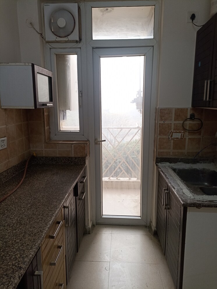 Kitchen, amrapali-eden-park 2 Bedroom 1140 Sq.Ft. Apartment In Sector 50 Noida 8975239