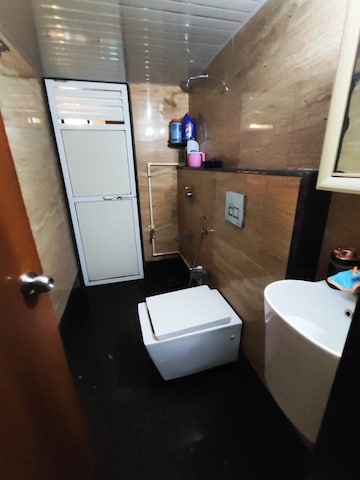 Bathroom in 2 BHK Apartment at Naupada – for Sale