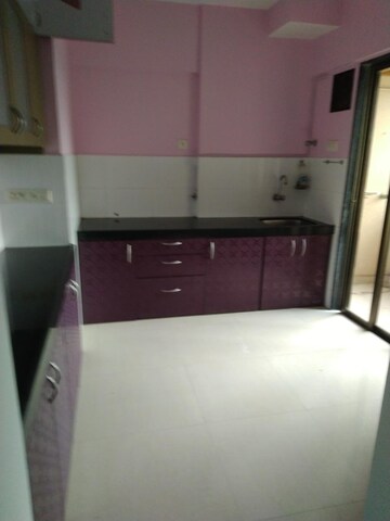 Kitchen in 2 BHK Apartment at Adarsh CHS Vasant Vihar, Vasant Vihar – for Rent