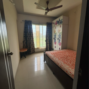Bedroom in 2 BHK Apartment at Charms Paradise, Ghotsai – for Sale
