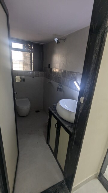 Bathroom in 2 BHK Apartment at Oakland Park, Andheri West – for Rent
