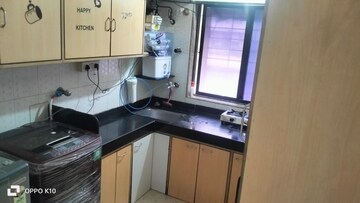 Kitchen in 2 BHK Apartment at China Link Apartment, Malad West – for Rent