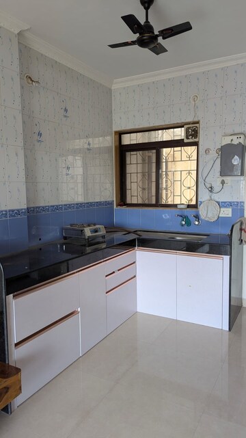 Kitchen in 2 BHK Apartment at Sudhir Mandke Aristocrat Housing Complex, Lulla Nagar – for Rent