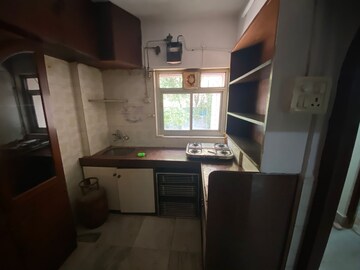 Kitchen in 2 BHK Apartment at Ahimsa Marg, Malad West – for Rent