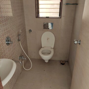 Bathroom in 1 BHK Apartment at The Makwana Om Palace, Malad West – for Rent