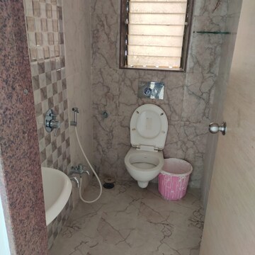 Bathroom in 1 BHK Apartment at The Makwana Om Palace, Malad West – for Rent