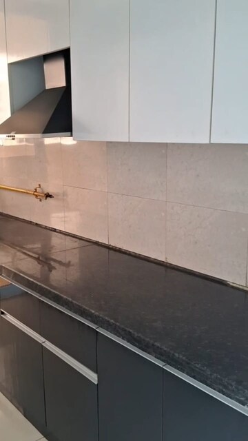 Kitchen in 3 BHK Apartment at Mahagun Mirabella, Sector 79 – for Rent