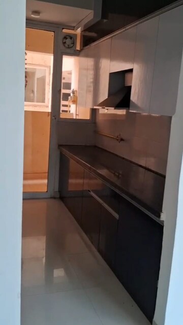 Kitchen in 3 BHK Apartment at Mahagun Mirabella, Sector 79 – for Rent