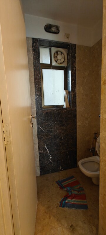 Bathroom in 2.5 BHK Apartment at Kalpataru Aura, Ghatkopar West – for Rent