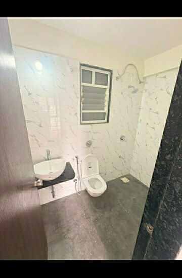 Bathroom in 2 BHK Apartment at Solitaire Apartment, Dhanori – for Rent