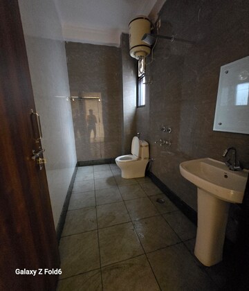 Bathroom in 1 BHK Builder Floor at Palm Residency Chhatarpur, Chattarpur – for Rent