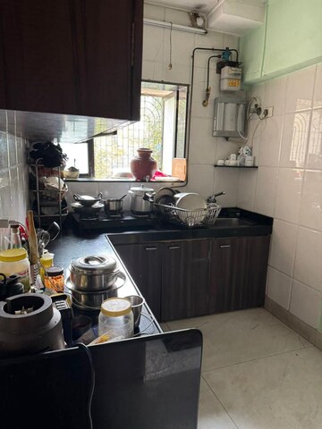 Kitchen in 1 BHK Apartment at Deepak Mahal CHS, Worli – for Rent