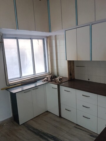 Kitchen in 2.5 BHK Villa at Unnat Nagar CHS, Goregaon West – for Rent