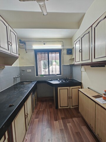 Kitchen in 2 BHK Apartment at Harbour Court, Nerul Sector 19a – for Rent