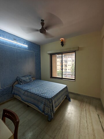 Bedroom in 2 BHK Apartment at Sai Satnam CHS, Nerul – for Rent