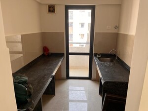 Kitchen in 2 BHK Apartment at Lodha Lakeshore Greens, Dombivli East – for Sale