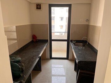 Kitchen in 2 BHK Apartment at Lodha Lakeshore Greens, Dombivli East – for Sale