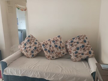 Living Room in 1 BHK Apartment at Raunak Heights, Ghodbunder Road – for Rent