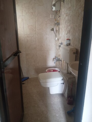 Bathroom in 1 BHK Apartment at Raunak Heights, Ghodbunder Road – for Rent
