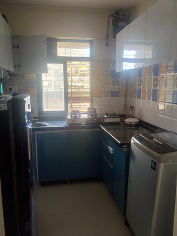 Kitchen in 1 BHK Apartment at Raunak Heights, Ghodbunder Road – for Rent