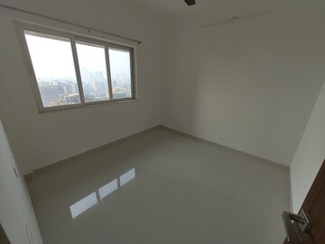 Room in 2 BHK Apartment at Omkar Signet, Malad East – for Rent