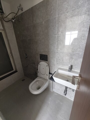Bathroom in 2 BHK Apartment at Omkar Signet, Malad East – for Rent
