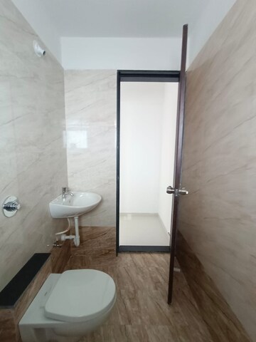 Bathroom in 2 BHK Apartment at Urban Skyline Phase 1, Ravet – for Rent