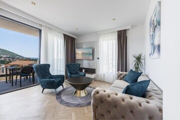 Living Room in 4 BHK Apartment at Mapsko Casa Bella-Apartments, Sector 82 – for Sale