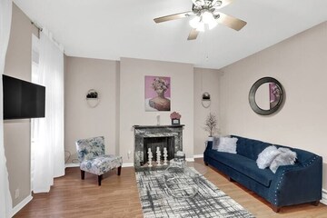 Living Room in 4 BHK Apartment at Adani M2K Oyster Grande, Sector 102 – for Sale