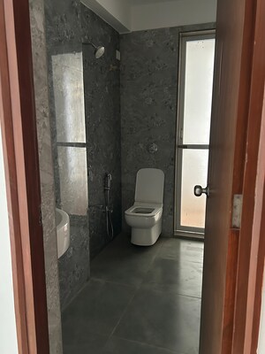 Bathroom in 3 BHK Apartment at Dura Giriraj Sparsh, Naupada – for Sale