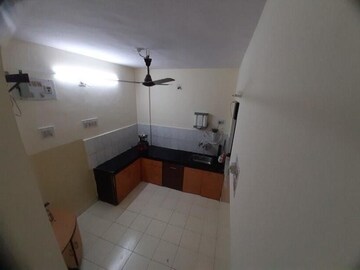Kitchen in 2 BHK Apartment at Nirman Nisarga, Bhusari Colony – for Rent