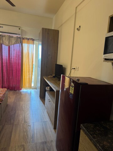 Living Room in 1 BHK Apartment at Paramount Golfforeste, Zeta I Greater Noida – for Rent