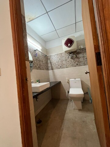 Bathroom in 1 BHK Apartment at Paramount Golfforeste, Zeta I Greater Noida – for Rent