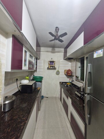 Kitchen in 2 BHK Builder Floor at Gurukrupa Marina Enclave, Malad West – for Sale