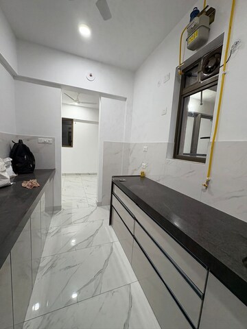 Kitchen in 2 BHK Apartment at Raymond Ten X Habitat, Pokhran Road No Two – for Rent