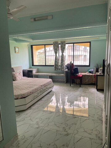 Living Room in 4 BHK Apartment at Jewel Palace, Khar West – for Sale