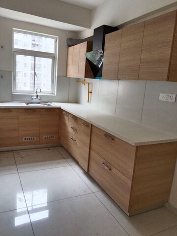 Kitchen in 2 BHK Apartment at Ashiana Anmol Phase 2, Sohna Sector 33 – for Rent