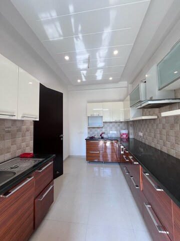 Kitchen in 3.5 BHK Builder Floor at Sushant Lok I – for Rent