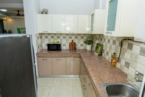 Kitchen in 3 BHK Apartment at AFOWO Raksha Addela, Sector 16c Greater Noida – for Sale