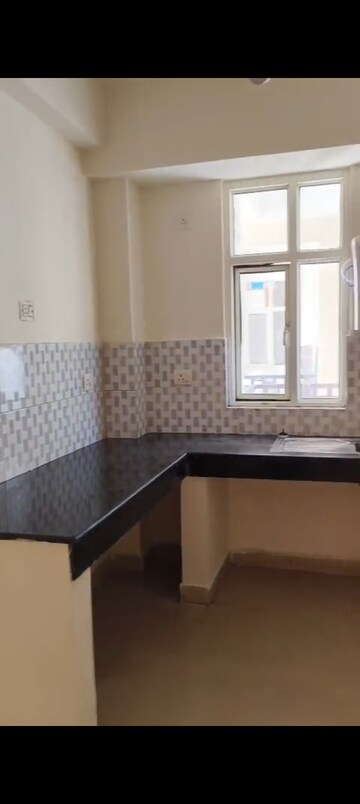 Kitchen in 2 BHK Apartment at Supertech EcoVillage III, Sector 16b Greater Noida – for Rent