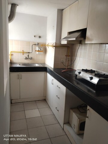 Kitchen in 1 BHK Apartment at Paras Seasons, Sector 168 – for Rent