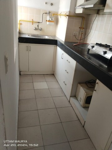 Kitchen in 1 BHK Apartment at Paras Seasons, Sector 168 – for Rent
