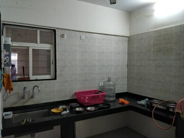 Kitchen in 2 BHK Apartment at Millennium Acropolis, Wakad – for Rent