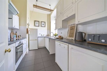 Kitchen in 4 BHK Apartment at Hero Homes Palatial, Sector 104 – for Sale