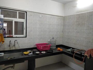 Kitchen in 3 BHK Apartment at Millennium Acropolis, Wakad – for Rent