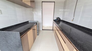 Kitchen in 2 BHK Apartment at DGS Sheetal Dharmaraj, Malad West – for Rent