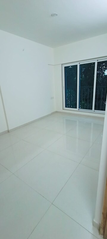 Room in 2 BHK Apartment at Hi Bliss Tower, Dahisar West – for Sale