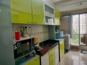 Kitchen in 2 BHK Apartment at Dedhia Palatial Height, Powai – for Rent